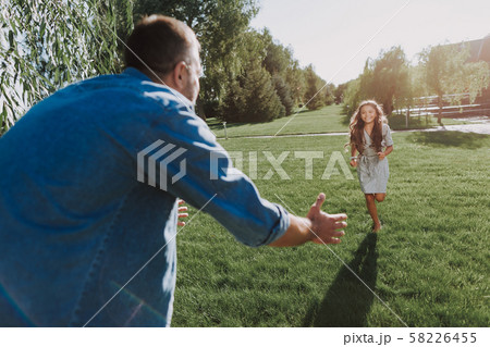 Father is spending time with his little daughter Father is spending time with his little daughter 58226455