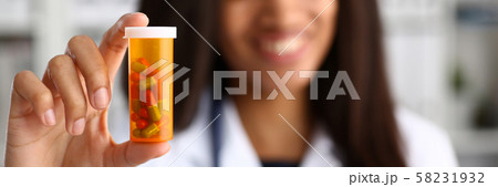 Female black doctor hands hold and give Female black doctor hands hold and give 58231932
