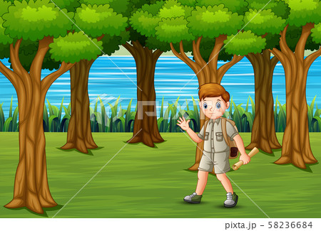 Boy scout with backpack hiking on the forest 58236684