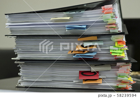 Extremely close up of the stacked office documents 58239594