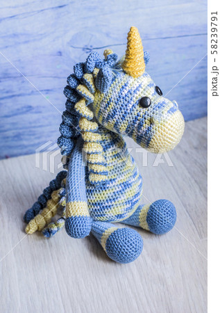 Crocheted unicorn blue of melange threads Crocheted unicorn blue of melange threads 58239791