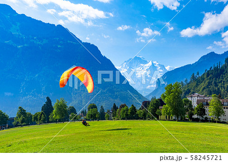 Paraglider in Interlaken, Switzerland Paraglider in Interlaken, Switzerland 58245721