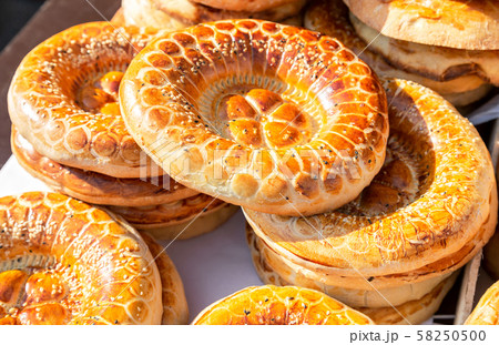 Appetizing uzbek flat breads from the tandir Appetizing uzbek flat breads from the tandir 58250500