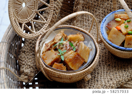 Vietnamese vegan food, breadfruit cook with sauce for vegetarian meal on burlap Vietnamese vegan food, breadfruit cook with sauce for vegetarian meal on burlap 58257033