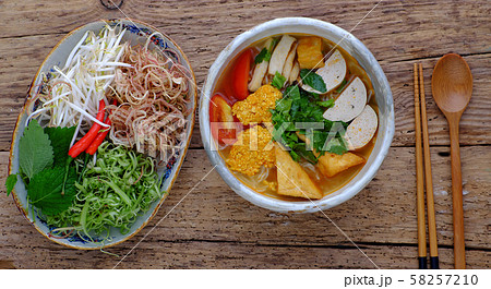 bowl of homemade vegan rieu noodle soup or vegetarian crab paste vermicelli soup bowl of homemade vegan rieu noodle soup or vegetarian crab paste vermicelli soup 58257210