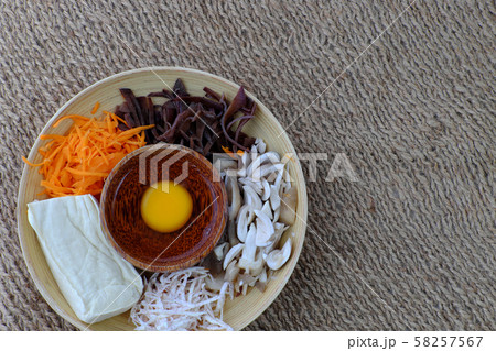 raw materials for vegetarian dish from mushroom, tofu, carrot 58257567