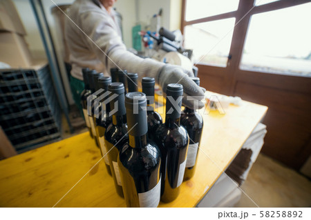 Bottles of wine on the table -Produced work at the winery Bottles of wine on the table -Produced work at the winery 58258892