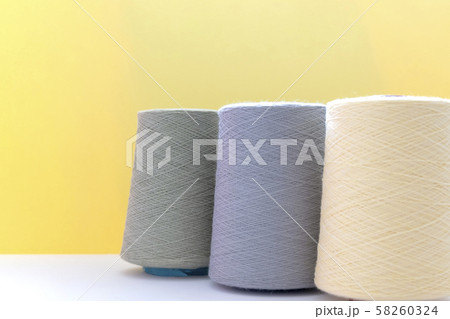 Pastel color bobbins of wool yarn for hand and Pastel color bobbins of wool yarn for hand and 58260324