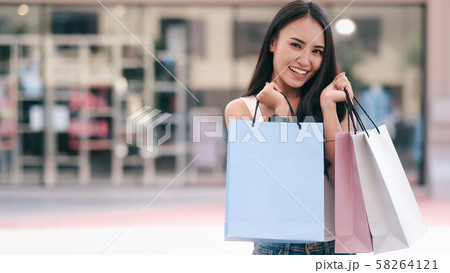 Happy beautiful woman enjoying in shopping. Happy beautiful woman enjoying in shopping. 58264121