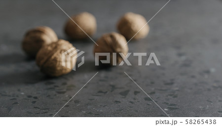 blurred inshell walnuts on terrazzo countertop blurred inshell walnuts on terrazzo countertop 58265438