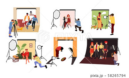 Photographers in studio. Cartoon models working at photo studio in different poses and with costumes 58265794