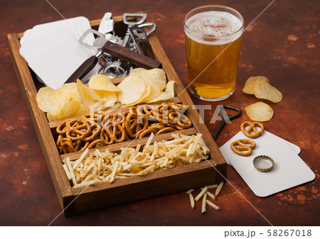 Glass of craft lager beer and opener with box of 58267018