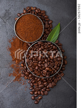 Fresh raw organic coffee beans with ground powder 58267092