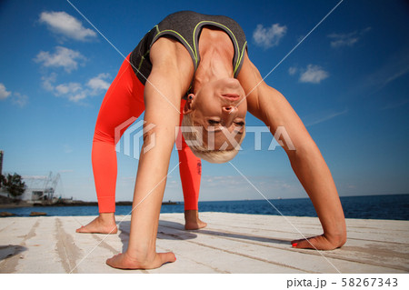 Close-up portrait of adult blond woman with short Close-up portrait of adult blond woman with short 58267343