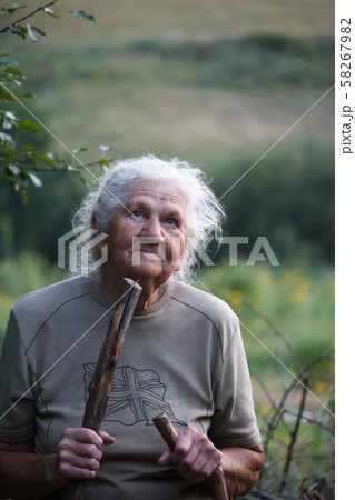 Portrait of an old woman with arthritic feet Portrait of an old woman with arthritic feet 58267982