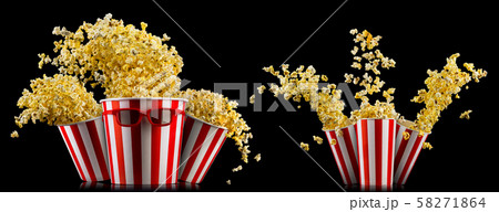 Set of buckets with popcorn and 3D glasses isolated on black background Set of buckets with popcorn and 3D glasses isolated on black background 58271864