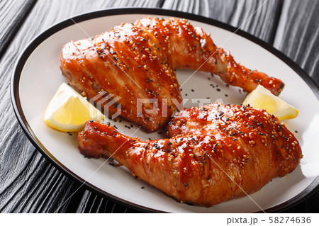 Grilled chicken quarter legs in honey-tomato 58274636