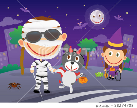 Blind boy dressed as mummy on halloween night. 58274708