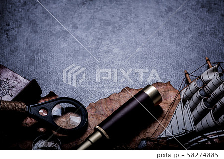 Columbus Day. Pirates and treasure with worldmap Columbus Day. Pirates and treasure with worldmap 58274885