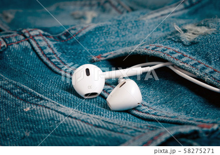 Earphones in the jeans pocket Earphones in the jeans pocket 58275271