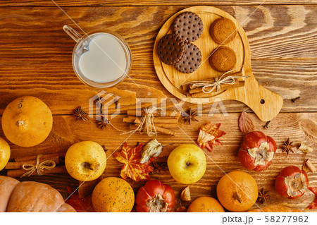 Cookies with milk on the table. 58277962