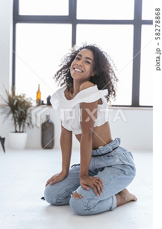 Beautiful woman spending her time by herself 58278868