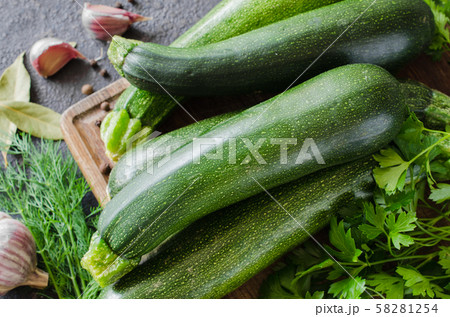 Organic zucchini, garlic and parsley, herbs and spices. Organic zucchini, garlic and parsley, herbs and spices. 58281254