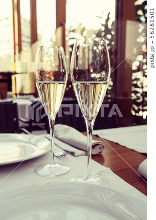 two glasses of tasty white wine at a restaurant two glasses of tasty white wine at a restaurant 58281501