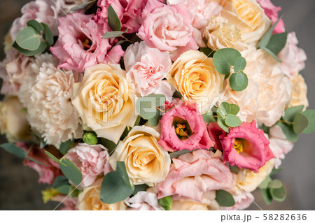 Close up Beautiful bouquet of mixed flowers. the work of the florist at a flower shop. Fresh cut 58282636
