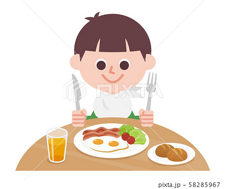 boy eating breakfast 58285967