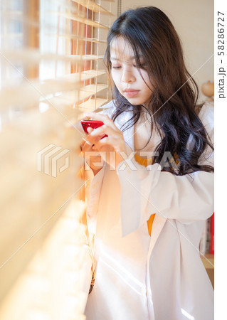 Sexy young asian beautiful women using smartphone 58286727