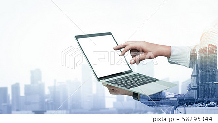 Double Exposure Image of Businessman Use Computer Double Exposure Image of Businessman Use Computer 58295044
