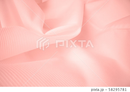 Shiny flowing cloth texture in macro shot. 58295781