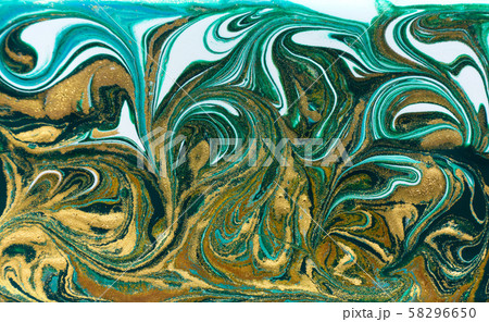 Green and gold glitter ripple pattern. Beautiful liquid texture. Green and gold glitter ripple pattern. Beautiful liquid texture. 58296650