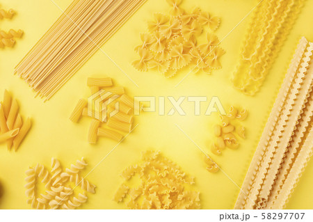 Italian pasta, flat lay banner with copy space, a top shot on a yellow background, a design template Italian pasta, flat lay banner with copy space, a top shot on a yellow background, a design template 58297707