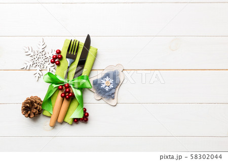 Top view of New Year dinner on wooden background. Top view of New Year dinner on wooden background. 58302044