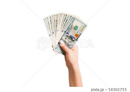 Top view of isolated female hand holding a fan of Top view of isolated female hand holding a fan of 58302755
