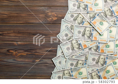 dollar bills a on a light colored background. copy dollar bills a on a light colored background. copy 58302793