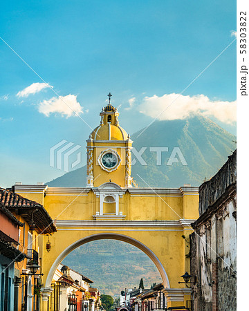 Arco de Santa Catalina and Volcan de Agua in Antigua Guatemala, Central America 58303822