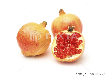 Ripe and Fresh Pomegranate Fruit on iSolated White Ripe and Fresh Pomegranate Fruit on iSolated White 58306773