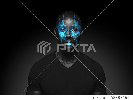 Close up portrait of young man isolated on black studio background 58308566