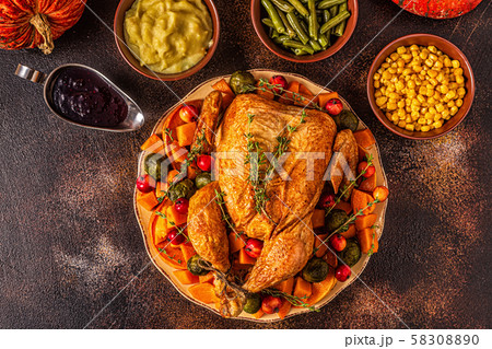 Served roasted turkey / chicken with vegetables. Served roasted turkey / chicken with vegetables. 58308890