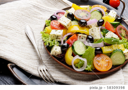 Mediterranean diet dish greek salad on vintage Mediterranean diet dish greek salad on vintage 58309398