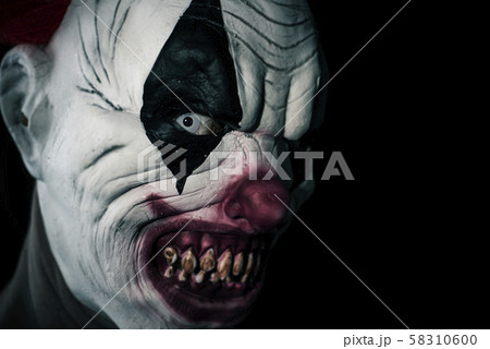 scary evil clown with a bloody mouth scary evil clown with a bloody mouth 58310600