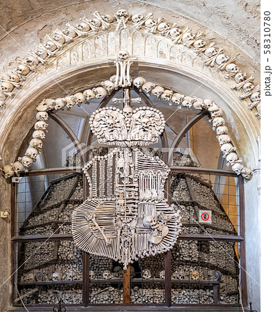 Human skulls and bones in ossuary Sedlec Kostnice 58310780