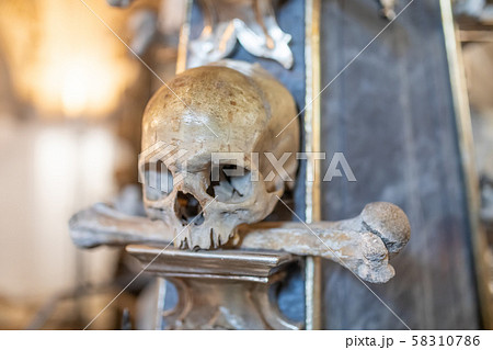 Human skulls and bones in ossuary Sedlec Kostnice 58310786
