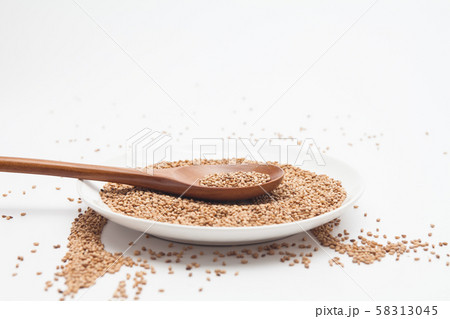 Sesame seeds on white background 58313045