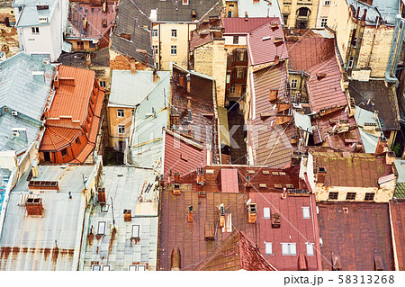 View of the old roofs. Bright color roofs of houses in historical city center 58313268