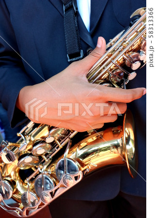 Hands on a trumpet close up. Hands on a trumpet close up. 58313366