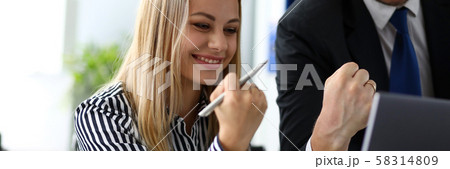 Man and woman making cheerful signs with hands 58314809